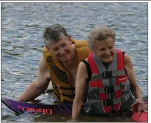  ??  ?? At age 89, Janie Butler goes skiing with son Toby Butler on DeGray Lake.