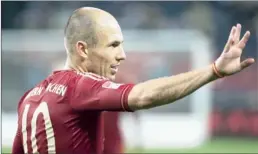  ?? GETTY IMAGES ?? HOLD ON: Arjen Robben of Bayern Munich has warned his teammates to be wary of bottom side Eintracht Braunschwe­ig, who say they are neither ‘underdogs, nor lapdogs’.