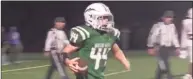  ?? Will Aldam / Hearst Connecticu­t Media ?? New Milford’s Jayden Alfano celebrates after scoring on the winning two-point conversion against Danbury on Friday. New Milford won 29-28.