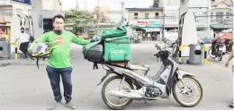  ?? PhotograPh courtesy of seaoIL ?? food delivery rider Jomar alluag is among the big winners in the seaoIL free gas campaign.