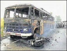 ?? FILE PHOTO ?? Vehicles were torched by protesters at Behbal Kalan village in Faridkot in October 2015 following a stir over incidents of sacrilege of Guru Granth Sahib.