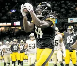  ?? Matt Freed/Post-Gazette ?? Receiver Sammie Coates pulls in a pass for a touchdown in the second quarter.