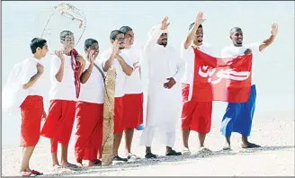  ??  ?? Left: Some of the pearl divers before boarding the ships, and (right) boats set for the pearl diving trip.