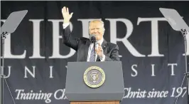  ?? PABLO MARTINEZ MONSIVAIS / ASSOCIATED PRESS ?? President Donald Trump gives the commenceme­nt address at Liberty University in Lynchburg, Va., on Saturday. “In America, we don’t worship government,” he said at one point. “We worship God.”