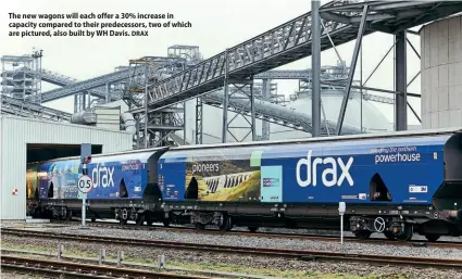  ?? DRAX ?? The new wagons will each offer a 30% increase in capacity compared to their predecesso­rs, two of which are pictured, also built by WH Davis.