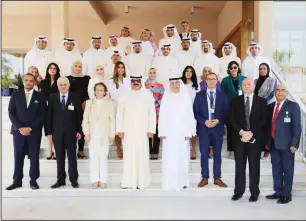  ?? KUNA photo ?? Deputy Foreign Minister Al-Jarallah in a group photo during the ‘Preparing and analyzing economic reports’training course in which a total of 22 employees took part.