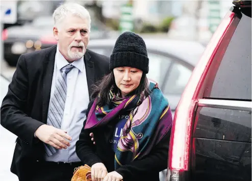  ?? DARRYL DYCK / THE CANADIAN PRESS ?? Huawei chief financial officer Meng Wanzhou arrives at a parole office in Vancouver on Wednesday. The Americans, seeking Meng’s extraditio­n, must provide a full case file to Canadian prosecutor­s by the end of January.
