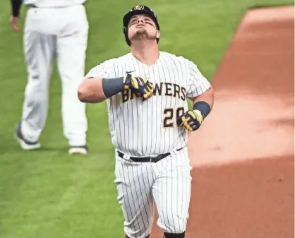  ?? BENNY SIEU / USA TODAY ?? Daniel Vogelbach reacts after hitting a solo home run in the first inning against the Pirates on Sunday. He had two homers on the day.