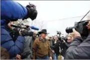  ?? BRYNN ANDERSON — ASSOCIATED PRESS FILE PHOTO ?? In this Tuesday, Dec. 12, 2017, file photo, journalist­s follow U.S. Senate candidate Roy Moore as he arrives to cast his vote in Gallant, Ala. December’s U.S. Senate election in Alabama was rife with fake online reports in support of Moore, who lost...