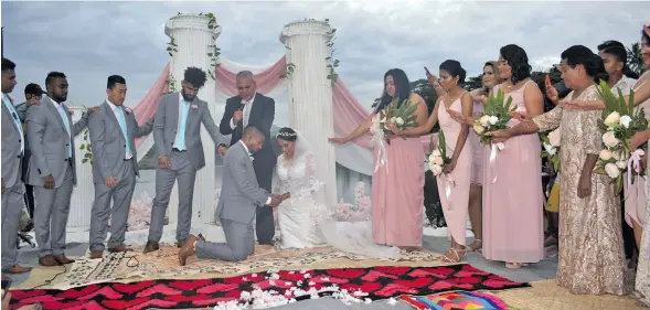  ?? Photo: Waisea Nasokia ?? The newly-weds Roy Krishna and Naziah Ali being blessed during their wedding in Ba on July 15, 2018.