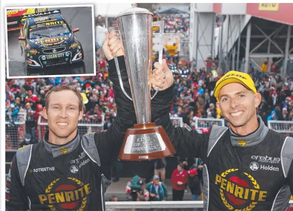  ??  ?? LAST LAUGH: Dave Reynolds and co- driver Luke Youlden celebrate after winning the Bathurst 1000 for Erebus Motorsport.