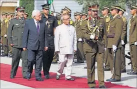  ?? REUTERS PHOTO ?? President Pranab Mukherjee reviews the guard of honour upon his arrival at the West Bank city of Ramallah on Monday.