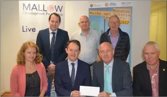  ??  ?? Sean Sherlock TD presenting a cheque for $5,000 from the Irish American Partnershi­p to Tom Cronin, chair of the Mallow Developmen­t Partnershi­p’s (MDP) Education and Technology sub-group. Also pictured are MDP members Peter Horgan, Pat O’Mahony, John...