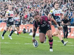  ?? Photo: PHOTOSPORT ?? Beastly best: Manu Vatuvei dots down during an impressive game for the Warriors in their 30-20 win over the Panthers at Mt Smart Stadium in Auckland yesterday.