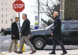  ?? CAROLYN KASTER AP ?? President Joe Biden walks from St. Edmund Roman Catholic Church after attending Mass in Rehoboth Beach, Del., on Saturday.