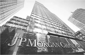  ??  ?? JPMorgan Chase is accused of discrimina­ting against minorities in home lending and against its own female employees by paying them less than their male counterpar­ts.