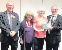  ??  ?? Park life Cambuslang Rotary Club welcome Joy Anderson and Anne Flannigan from the Friends of Cambuslang Park