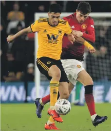  ?? AFP ?? Raul Jimenez, left, and Wolves beat Manchester United twice and drew once last season