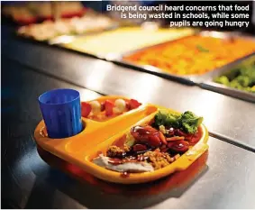  ?? ?? Bridgend council heard concerns that food is being wasted in schools, while some pupils are going hungry