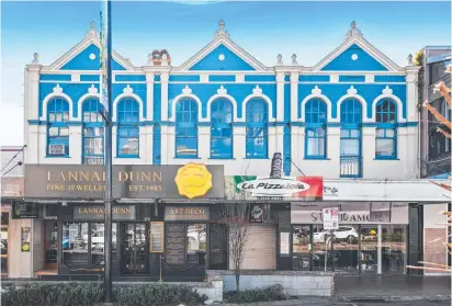  ?? ?? PRIME SITE: Colliers Internatio­nal Toowoomba has listed this two-storey property on Margaret Street for sale.