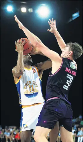  ?? PHOTO: GETTY IMAGES ?? No way through . . . Brisbane Bullets guard AJ Davis is blocked by New Zealand Breakers forward Finn Delany during the ANBL game in Auckland yesterday. The Breakers won 10996.
