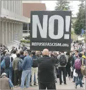  ?? STAFF FILE PHOTO ?? A protester holds a sign during a Berkeley College Republican­s press conference on the UC Berkeley campus 2017. The event was held to discuss the cancellati­on of speaker Ann Coulter’s appearance on campus.