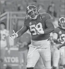  ?? Associated Press ?? Headed to the NFL: Alabama defensive lineman Christian Barmore celebrates after a tackle against Ohio State during the first half of the NCAA College Football Playoff national championsh­ip game Monday in Miami Gardens, Fla.