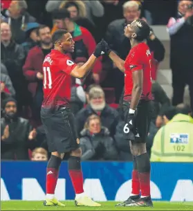  ?? FOTO: AP ?? Martial y Pogba, los autores de los dos goles del United frente al Everton