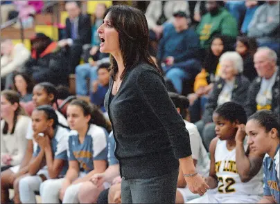  ?? DANA JENSEN/THE DAY ?? New London High School girls’ basketball coach Holly Misto shouts out instructio­ns to her team during the game against Capital Prep on Dec. 20 at New London. She was honored by the CSWA on Monday as its coach of the year.