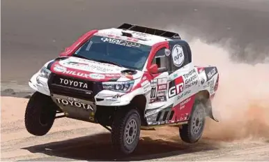  ?? EPA PIC ?? Qatari driver Nasser AlAttiyah drives his Toyota Hilux during the sixth stage of the Dakar Rally on Sunday.