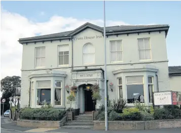  ??  ?? The Cross House Inn occupies a prominent position in Three Tuns Lane, Formby