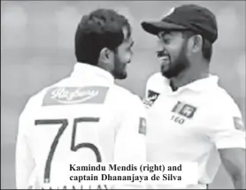  ?? ?? Kamindu Mendis (right) and captain Dhananjaya de Silva