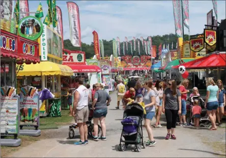  ?? LAUREN HALLIGAN - MEDIANEWS GROUP FILE ?? A crowd enjoys the 2019 Saratoga County Fair. Due to the Novel Coronaviru­s pandemic, this year’s fair was canceled for the first time since the Civil War.
