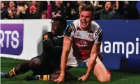  ??  ?? Jacob Stockdale celebrates after scoring Ulster’s first try