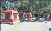  ?? RANDY VAZQUEZ — STAFF PHOTOGRAPH­ER ?? “Hope Village,” a tent village in an empty parking lot in San Jose, seen on Tuesday, was ordered to be shut down earlier in the week but is still standing as of Friday.