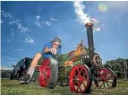  ?? PHOTO: WARWICK SMITH/ STUFF ?? Awapuni’s Bruce Geange fires up his steam traction engine.