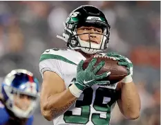  ?? GETTY IMAGES ?? Valentine Holmes makes a catch for the New York Jets during a preseason match. He was confined to the practice squad for the season proper.