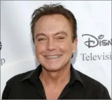  ?? DAN STEINBERG — THE ASSOCIATED PRESS FILE ?? In this file photo, actor-singer David Cassidy arrives at the ABC Disney Summer press tour party in Pasadena. Former teen idol Cassidy of “The Partridge Family” fame has died at age 67, publicist said Tuesday. He is shown at right in 1972.