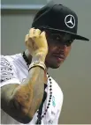  ?? MARK THOMPSON/GETTY IMAGES ?? Lewis Hamilton after practice for the Formula One Grand Prix of Singapore on Friday.