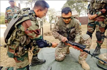  ?? IANS ?? Soldiers of India and Kazakhstan participat­e in a joint training exercise at Bakloh, Himachal Pradesh, on Friday.