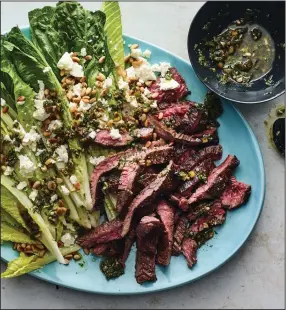  ?? (The New York Times/Andrew Purcell) ?? Lidey Hueck’s Skirt Steak With Salsa Verde Salad