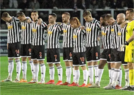  ?? PICTURES: Simon Howe ?? Bath City hold a minute’s silence in honour of the passing of Queen Elizabeth II before their victory over Weymouth