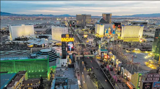  ?? Michael Quine
Las Vegas Review-journal @Vegas88s ?? Aerial view on Jan. 12 of the south Las Vegas Strip, whose usual activity was greatly curtailed by the pandemic.