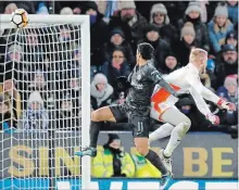  ?? FRANK AUGSTEIN THE ASSOCIATED PRESS ?? Chelsea's Pedro, centre, scores his side's second goal during the English FA Cup quarterfin­al soccer match between Leicester City and Chelsea, at the King Power stadium in Leicester, England, Sunday.