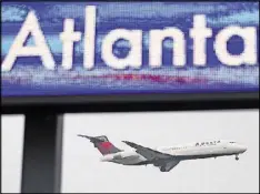  ?? JOHN SPINK / JSPINK@AJC.COM ?? Airfares are down making 2017 a good year to fly.