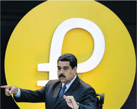  ?? FEDERICO PARRA/AFP/GETTY IMAGES ?? Venezuela’s President Nicolas Maduro announces the launch of the pre-sale phase of the country’s new oil-backed cryptocurr­ency called “petro” in Caracas on Tuesday. Maduro sees the cryptocurr­ency as a panacea to its litany of problems, but his...