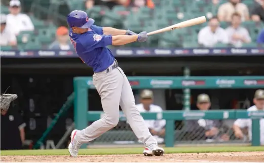  ?? PAUL SANCYA/AP ?? Third baseman Matt Duffy (3-for-5, five RBI) connects for a three-run homer in the fifth inning Saturday against the Tigers.