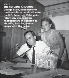  ?? AP FILE ?? THE RETURNS ARE GOOD: George Bush, candidate for the Republican nomination for the U.S. Senate in 1964, gets returns by phone at his headquarte­rs in Houston as his wife, Barbara, seems happy with the news.