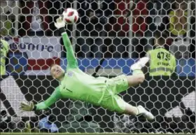  ?? MATTHIAS SCHRADER — ASSOCIATED PRESS ?? England goalkeeper Jordan Pickford saves a penalty against Colombia on July 3 in Moscow.