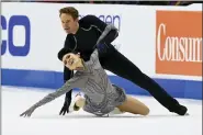  ?? MARK ZALESKI — THE ASSOCIATED PRESS FILE ?? FILE -Madison Chock and Even Bates compete in the ice dance program during the U.S. Figure Skating Championsh­ips Saturday, Jan. 8, 2022, in Nashville,
Tenn. U.S. figure skaters who win national championsh­ips get their names inscribed on a plaque and trophy. It’s something they relish. It’s also something special to peruse the names already there — particular­ly for ice dancers.(